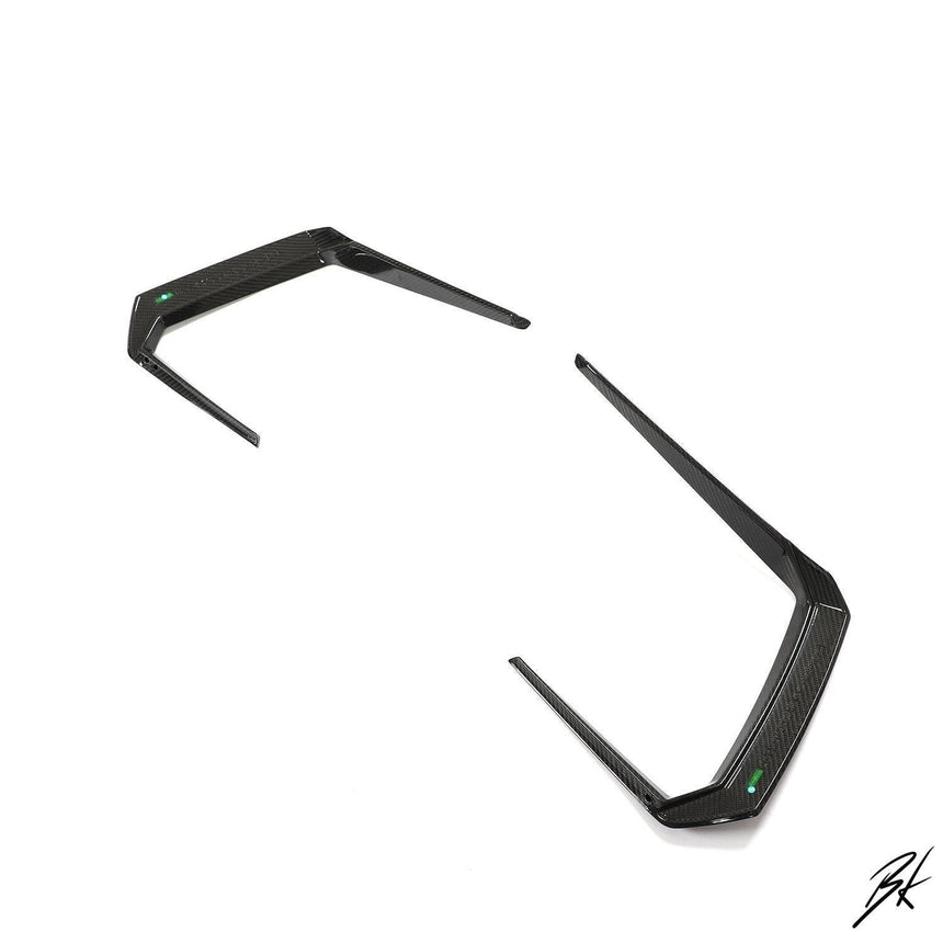 BodyKits Aerodynamics LLC carbon fiber front canards for 2018-2021 Lamborghini Urus with a sleek aerodynamic design.