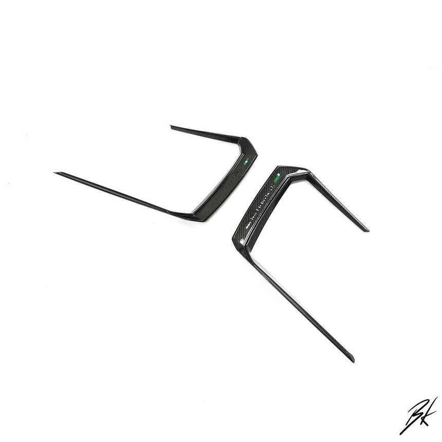 BodyKits Aerodynamics LLC carbon fiber front canards for 2018-2021 Lamborghini Urus with a sleek aerodynamic design.