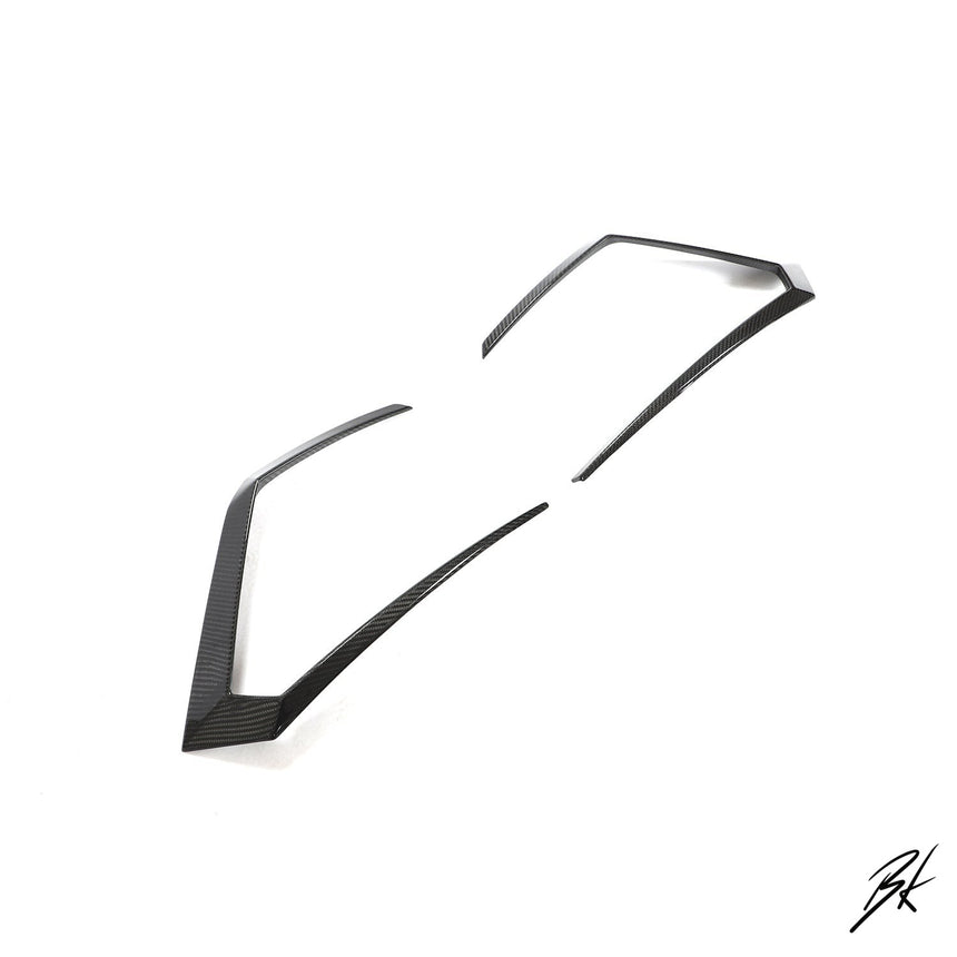 BodyKits Aerodynamics LLC dry carbon fiber front canards for 2018-2021 Lamborghini Urus with sleek angular design
