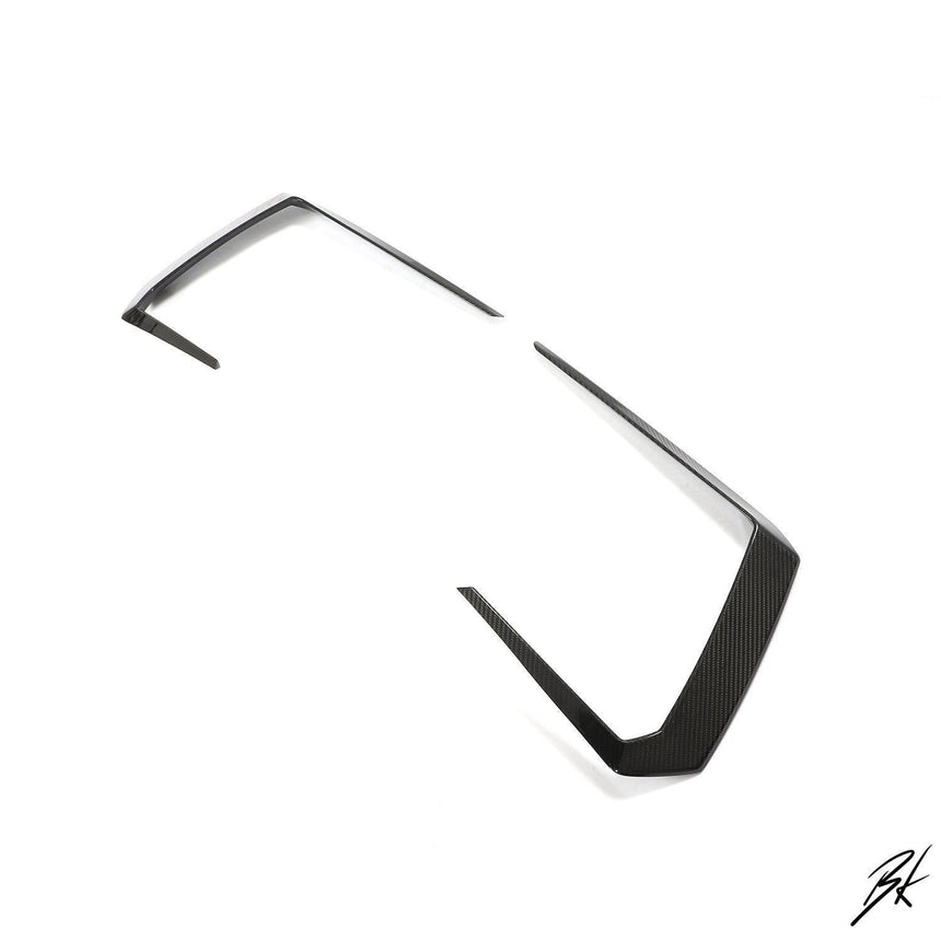 BodyKits Aerodynamics LLC carbon fiber front canards for 2018-2021 Lamborghini Urus with a sleek aerodynamic design.