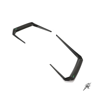 BodyKits Aerodynamics LLC carbon fiber front canards for 2018-2021 Lamborghini Urus with a sleek aerodynamic design.