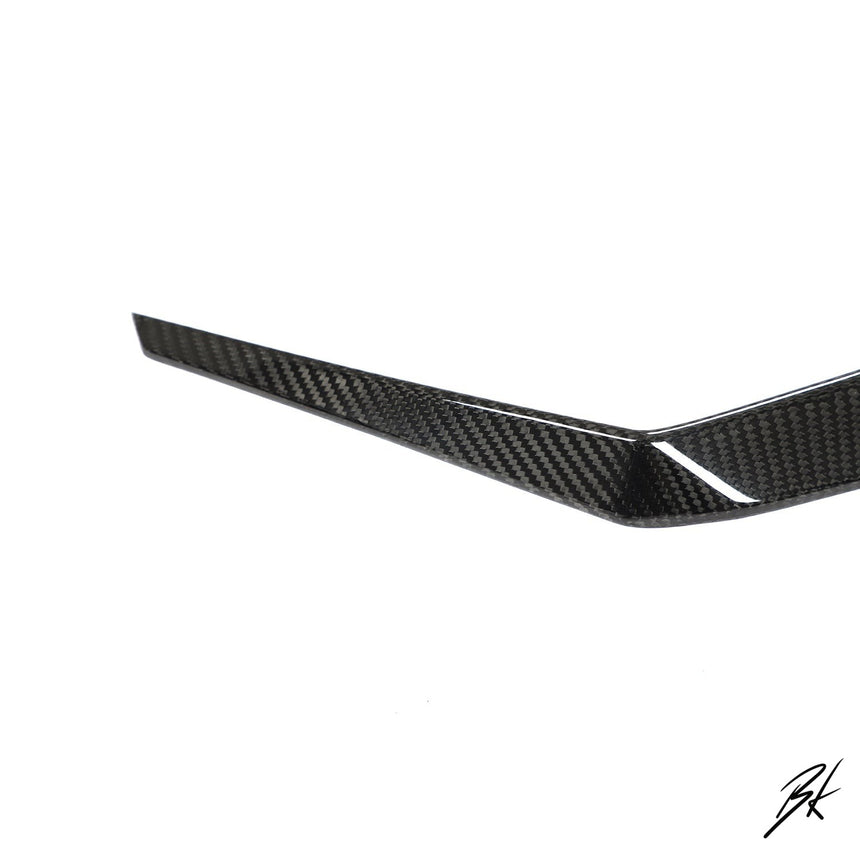 BodyKits Aerodynamics LLC dry carbon fiber canard for 2018-2021 Lamborghini Urus with a glossy weave finish.