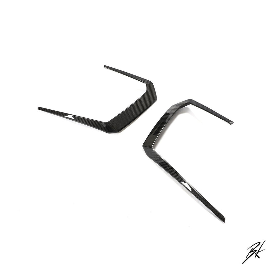 BodyKits Aerodynamics LLC carbon fiber front canards for 2018-2021 Lamborghini Urus with a sleek aerodynamic design.
