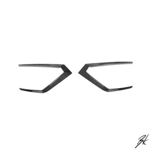 BodyKits Aerodynamics LLC dry carbon fiber front canards for 2018-2021 Lamborghini Urus with a sleek aerodynamic design.