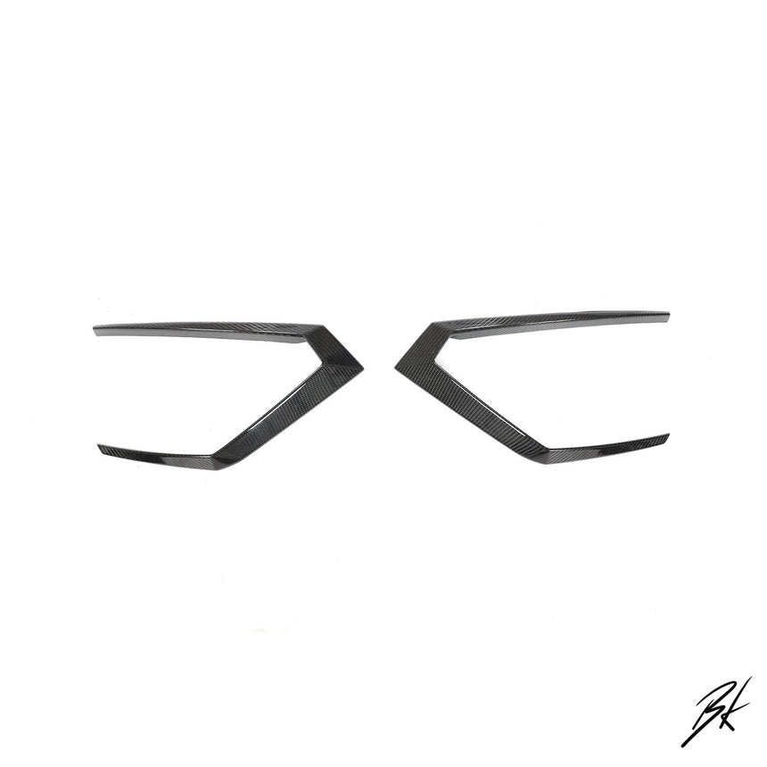 BodyKits Aerodynamics LLC dry carbon fiber front canards for 2018-2021 Lamborghini Urus with a sleek aerodynamic design.