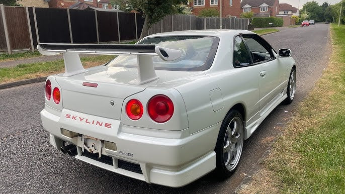 Nissan Skyline R34 GTR 1998-2005 Carbon Fiber OEM Spoiler with JUN High Spoiler Leg